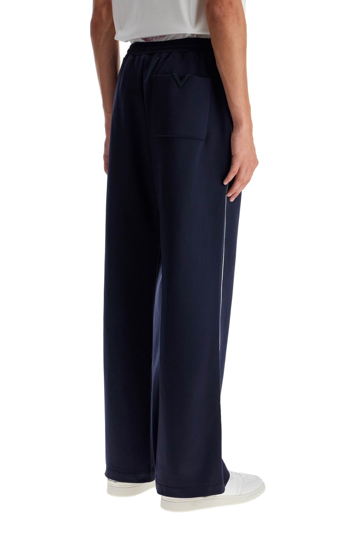 Valentino Garavani jogger pants with metallic v detail